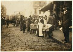 Boys selling goods in a Boston market circa early 1900s