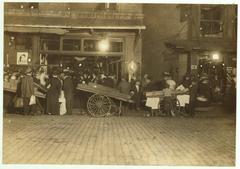 Late night scene at Boston market with vending stands and wagons