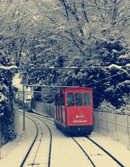 Polybahn funicular in Zurich during winter snowfall