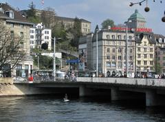 Central Zurich view from Bahnhofbrücke with Limmatquai to the right and Polybahn building in background