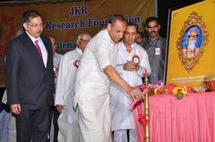 Governor lighting the lamp at Raghavachary centenary celebration