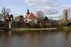 Panorama of Burg Hayn in Dreieich with castle church and castle pond