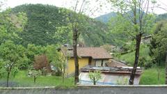 scenic rural landscape with green fields and mountains