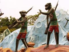 Armed monkeys statue at Haw Par Villa in Singapore