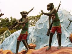 armed monkeys statues at Haw Par Villa in Singapore