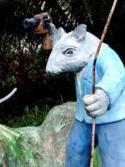 Armed rat sculpture at Haw Par Villa in Singapore