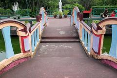 Bridge connecting to pavilion island at Haw Par Villa