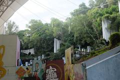 Amphitheatre with white tent draped over structure at Haw Par Villa