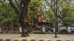 a panoramic view of Ernakulam city with modern buildings and lush green surroundings