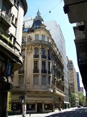 Piedras Street in downtown Buenos Aires with a Beaux Arts building