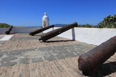 Forte de São Mateus do Cabo Frio with stone walls and a clear blue sky