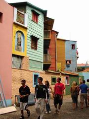 Colorful buildings and pedestrians in La Boca neighborhood, Buenos Aires