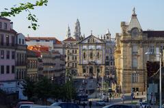 Av. Dom Afonso Henriques with Church of Saint Anthony of Congregados and Sao Bento railway station in Porto, Portugal