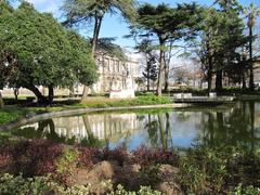 Beautiful view of Jardim da Cordoaria with lush greenery and historic statues