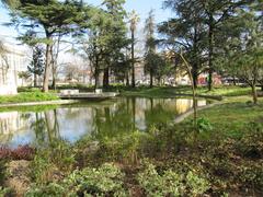 Beautiful view of Jardim da Cordoaria with manicured lawns, trees, and sculptures