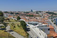 Port wine cellars along Douro River facing Porto