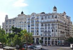 View of buildings in Plaça de l'Ajuntament from a balcony in Valencia, Spain