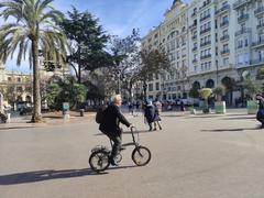 Joan Ribó cycling in Plaça de l'Ajuntament, València