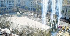 beginning of a mascletá at the Plaza del Ayuntamiento in Valencia