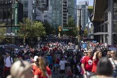 Canada Place during Canada Day 2024 celebrations with crowd and stage