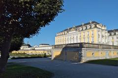 View of Schloss Augustusburg in Brühl, with the South Orangery on the left and the tower of Schlosskirche in the background