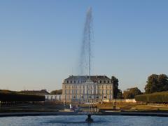 Schloss Augustusburg view from the park with a fountain in the foreground