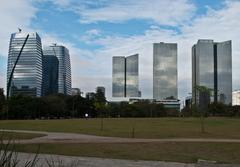 monument in Brazil with ID surrounded by buildings and park area