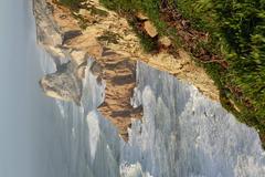 Scenic landscape of Parque Natural de Sintra-Cascais with lush greenery and rugged terrain