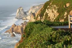 Scenic view of Parque Natural de Sintra-Cascais with lush greenery and rolling hills