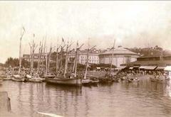 Rio de Janeiro Cais Pharoux with the Fish Market Beach, rotunda building with dome, and Ministry of Industry, Transportation and Public Works on the left