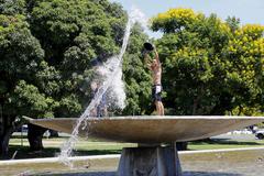 Praça do Buriti with well-maintained gardens, water features, and striking fountains