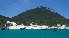 dock of do Forte beach with anchored tourism ships