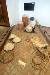 Exhibit showcasing traditional hat-making at the Vietnam Museum of Ethnology, Hanoi