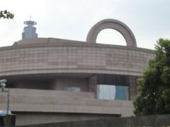 Shanghai Museum building with a round top and square base