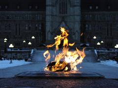 Ottawa Parliament flame in front of the Parliament buildings