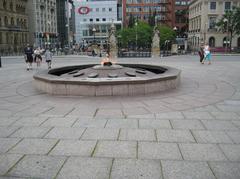 Centennial Flame in Ottawa 2004 at night with Parliament buildings in the background