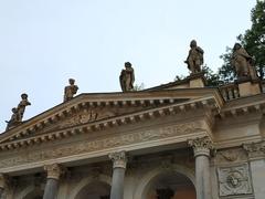 Allegorical statues on the northern tympanum of Mill Colonnade in Karlovy Vary