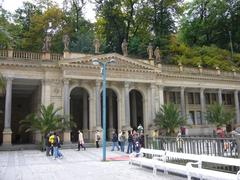 Scenic view of Karlovy Vary in September with historic buildings by the river