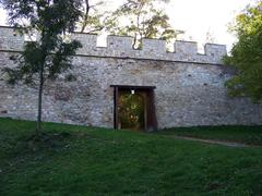 Gothic city walls and gate in Prague's Hradčany neighborhood