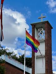 LGBTQ flag in front of a church in Hamburg