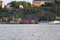 Mariaberget with Ivar Los park and the hotel boats Den Röda Båten, Ran af Stokcholm and Rygerfjord at Riddarfjärden, Södermalm, Stockholm, Sweden