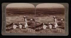 Three men in front of the plain of Thebes