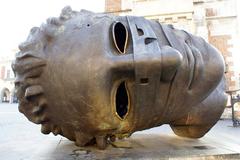 Igor Mitoraj's Eros Bendato sculpture at Kraków marketplace