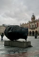 Eros Bendato Giant Head Sculpture in Kraków