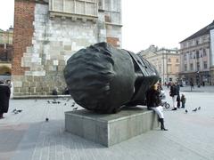 Giant head sculpture at Krakow main square