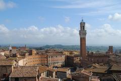 Siena Italy cityscape with historic buildings and church tower