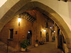 Poble Espanyol, Arcos de la Lonja, with Travessia del Maestrat in the background in Barcelona