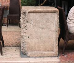 people participating in a public archaeology event in Verona, mapping the area near Porta Borsari