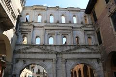 A picturesque view of Verona with historic buildings and the Adige River