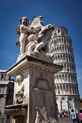 Leaning Tower of Pisa with surrounding green lawn